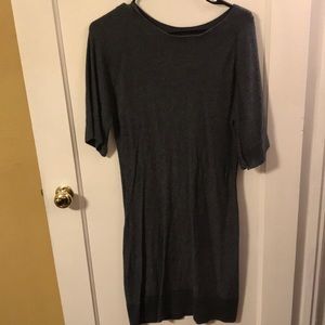 Long grey , half sleeve dress .